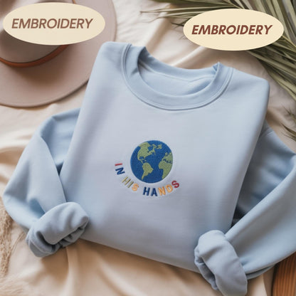 In His Hands Embroidered Sweatshirt, Christian Earth Design Shirt, Faith Based Gift for Her, God’s Love Embroidery, Spiritual Cozy Hoodie