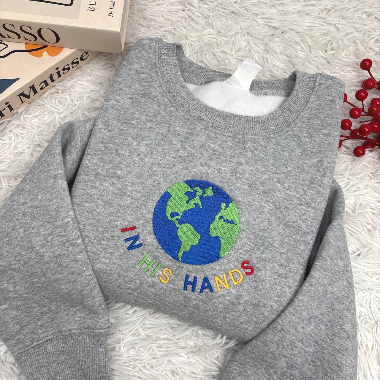 In His Hands Embroidered Sweatshirt, Christian Earth Design Shirt, Faith Based Gift for Her, God’s Love Embroidery, Spiritual Cozy Hoodie