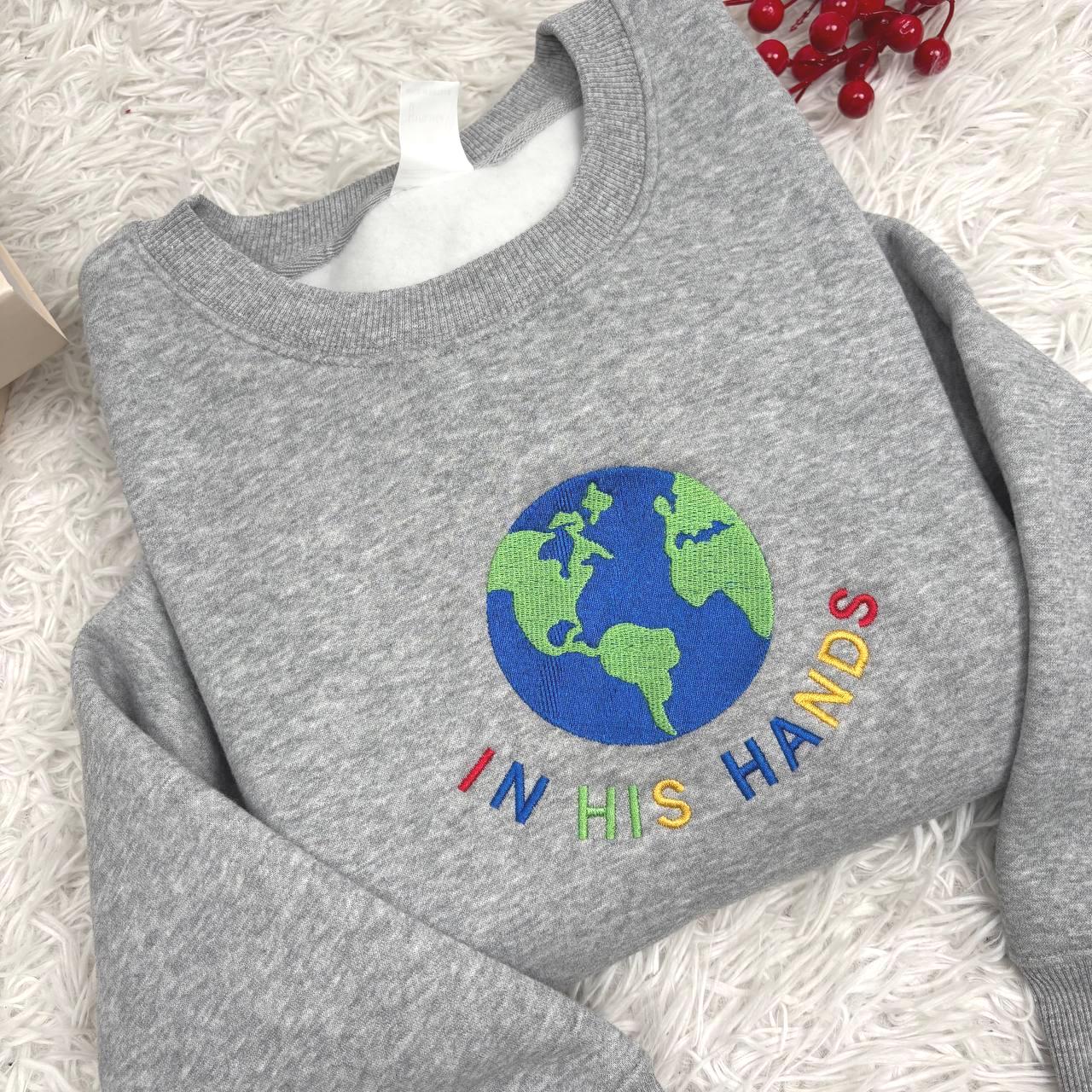 In His Hands Embroidered Sweatshirt, Christian Earth Design Shirt, Faith Based Gift for Her, God’s Love Embroidery, Spiritual Cozy Hoodie