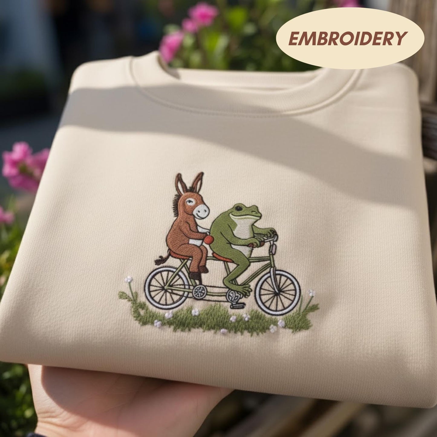 Donkey and Frog Riding Bicycle Embroidered Sweatshirt, Cute Animal Tandem Bike Crewneck, Whimsical Friendship Gift, Aesthetic Sand Sweater