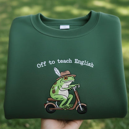 Off To Teach English Embroidered Shirt, Funny Frog Teacher Sweatshirt, Frog Riding Scooter Crewneck, English Teacher Gift Shirt