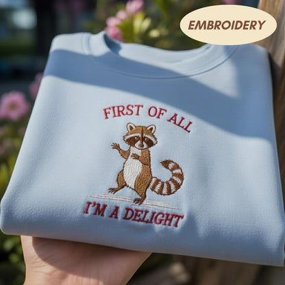 First Of All I'm A Delight Embroidered Sweatshirt, Funny Raccoon Shirt, Sarcastic Animal Apparel, Cute Raccoon Crewneck, Meme Sweater