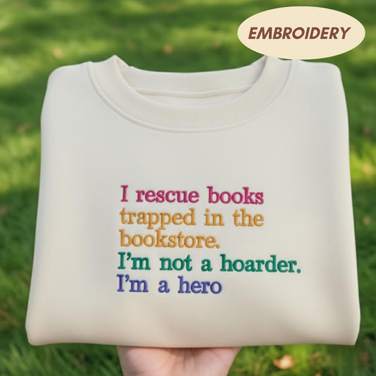 I Rescue Books Trapped In The Bookstore Embroidered Sweatshirt, Funny Book Lover Shirt, Bibliophile Apparel, Bookworm Hero Crewneck Top